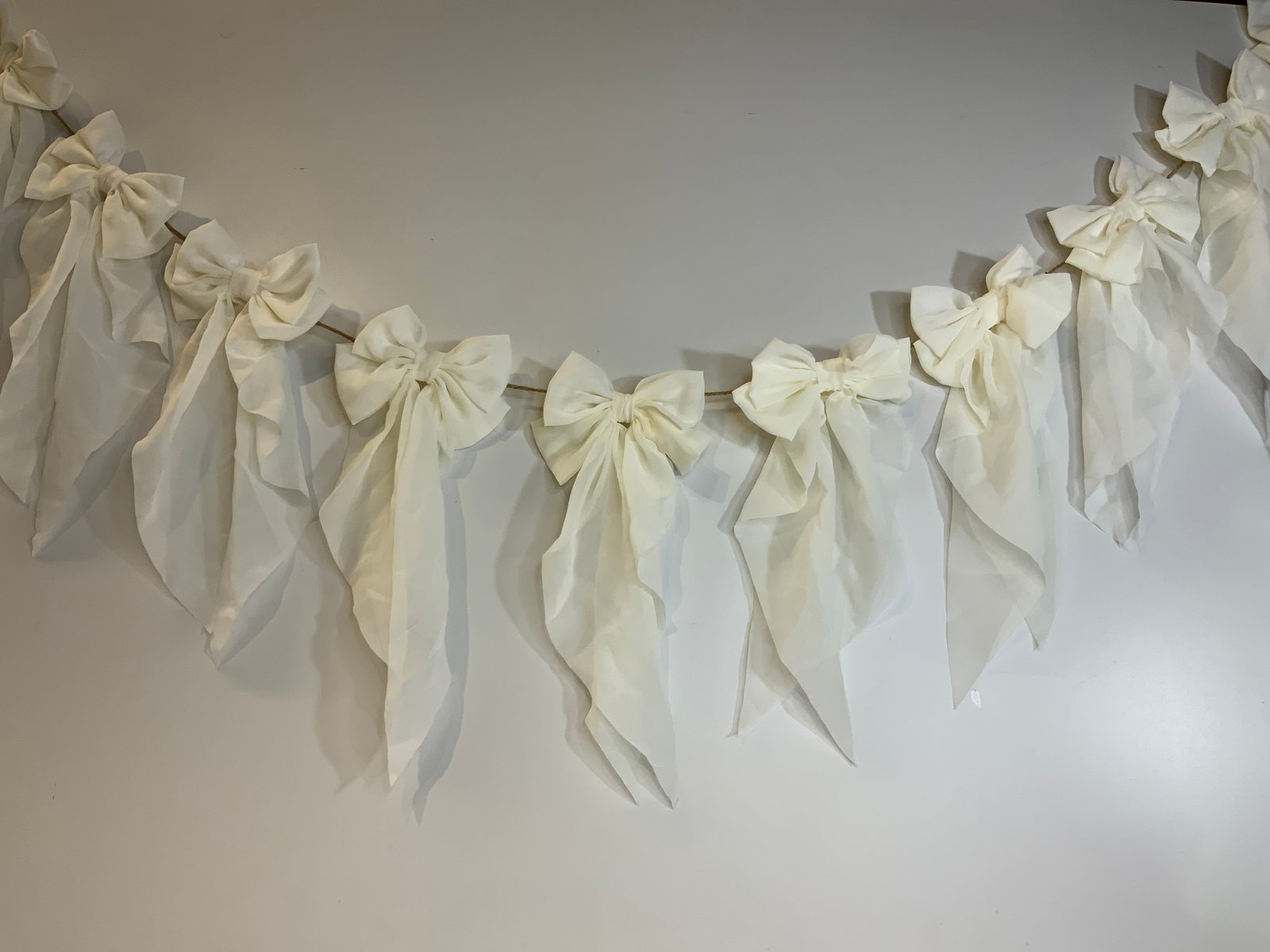 Banderin Moños Blancos
